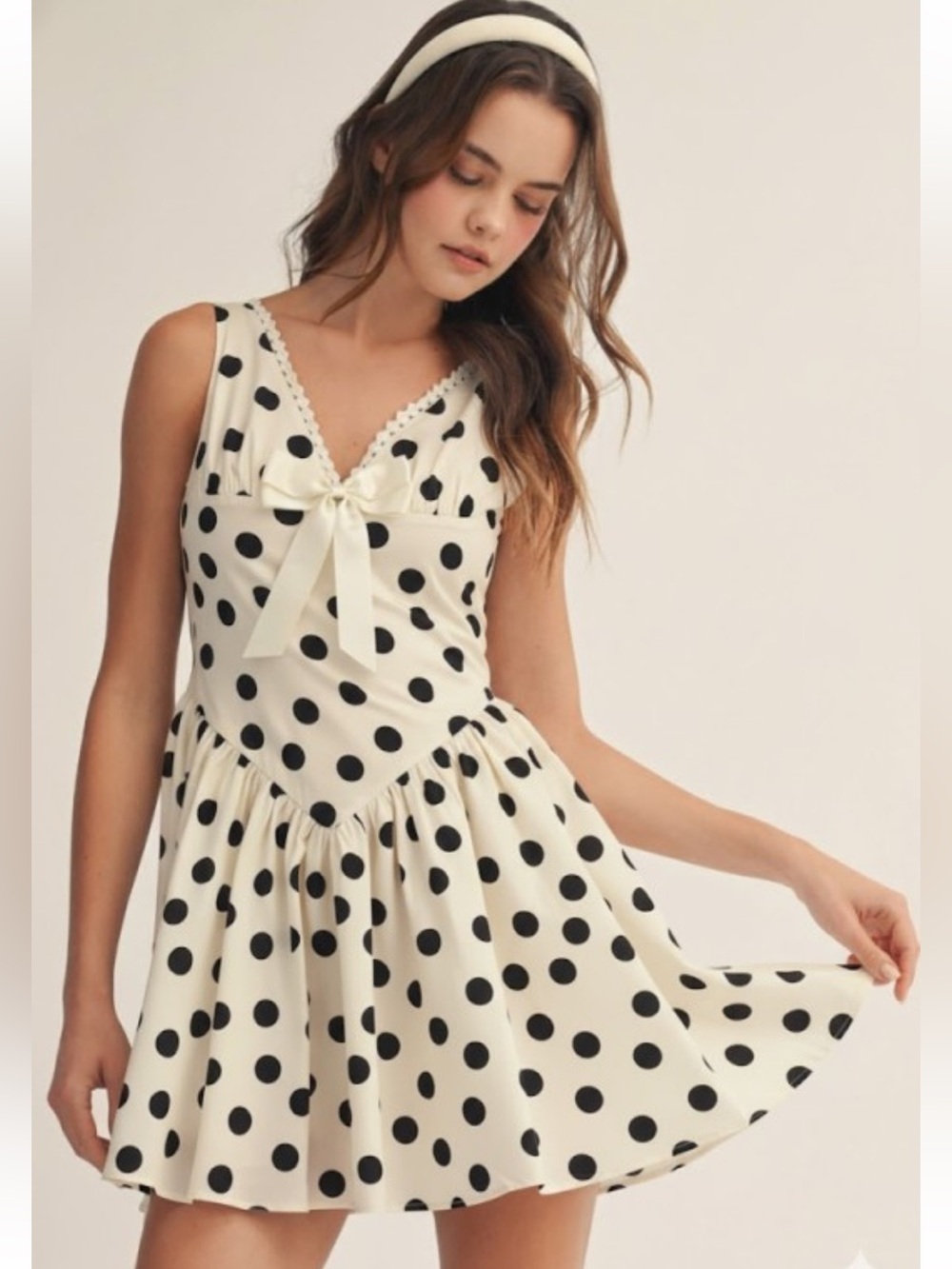 949. Polka dot v-neck fit and flare mini dress ivory